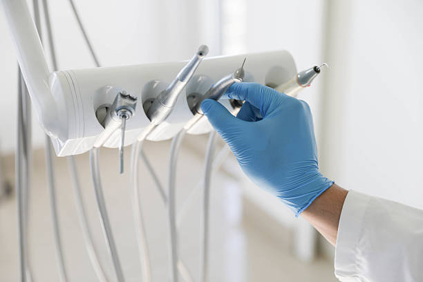 Professional Tooth Extraction technician working in Fairfax, OK
